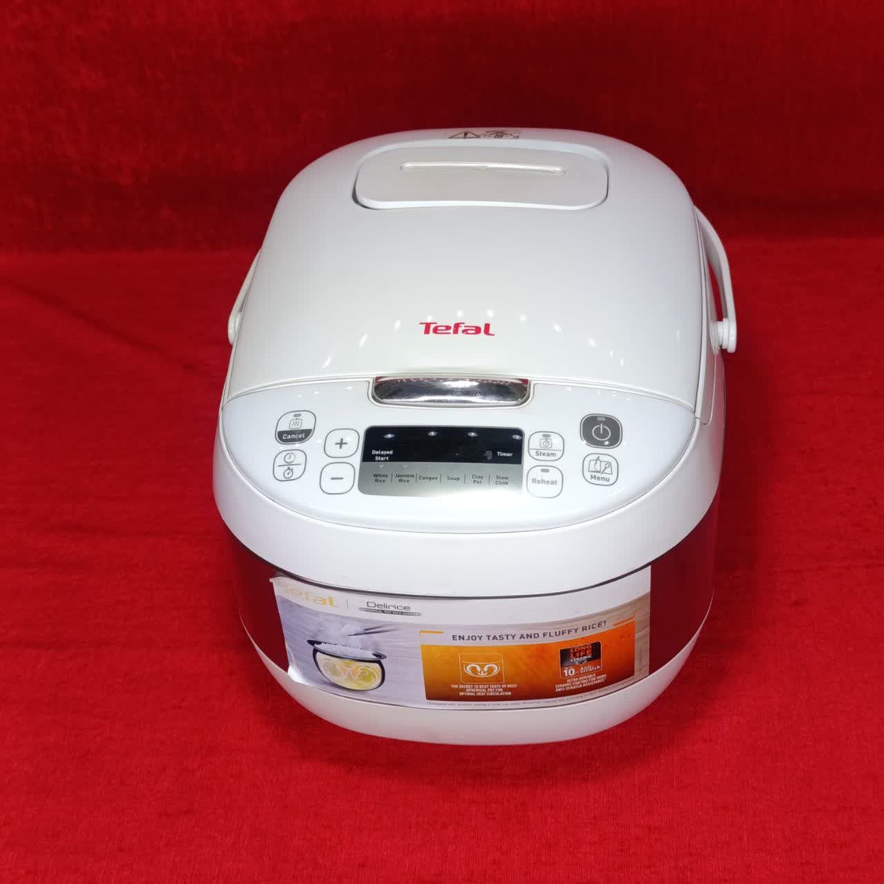 پلوپز برقی ژاپنی برند tefal ظرفیت 10 نفره ساخت هلند(دارای ظرف بخارپز) - Image 9